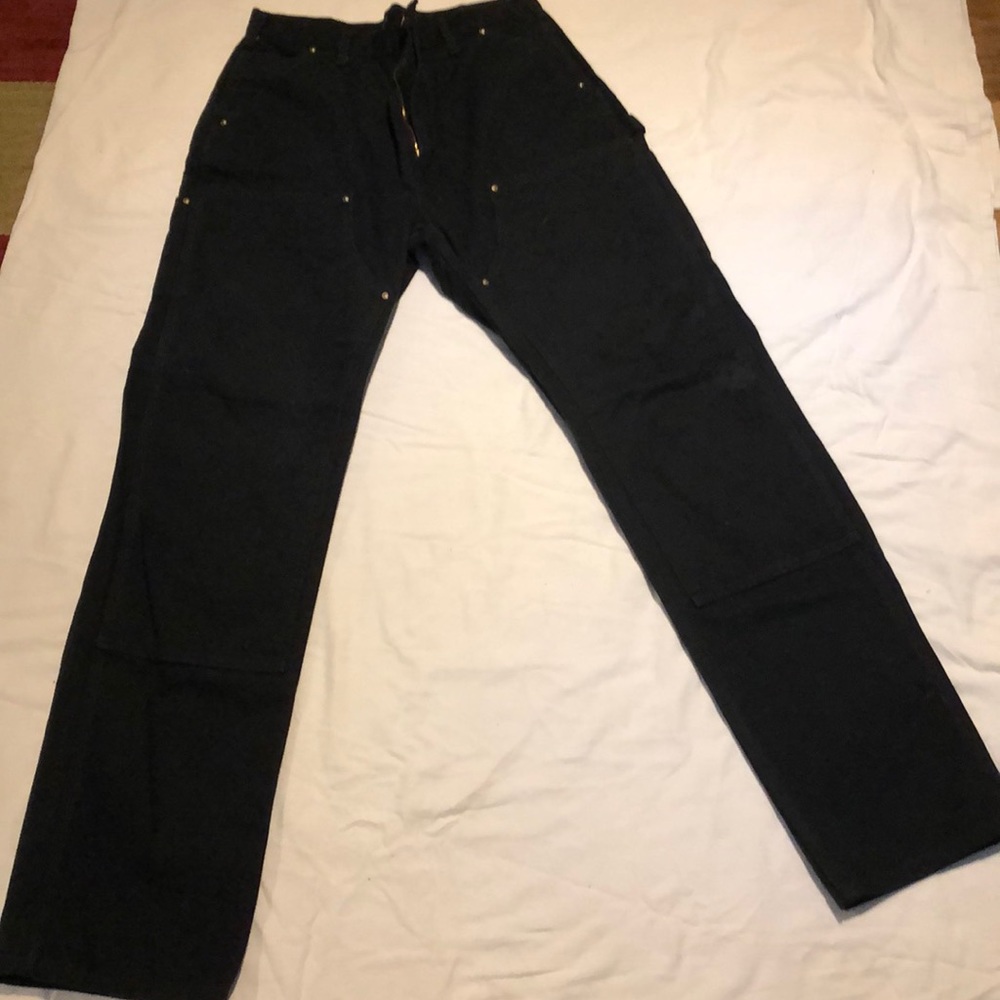 Black 36x36 Carhartt double front carpenter pants. Awesome condition. Heavy wt.